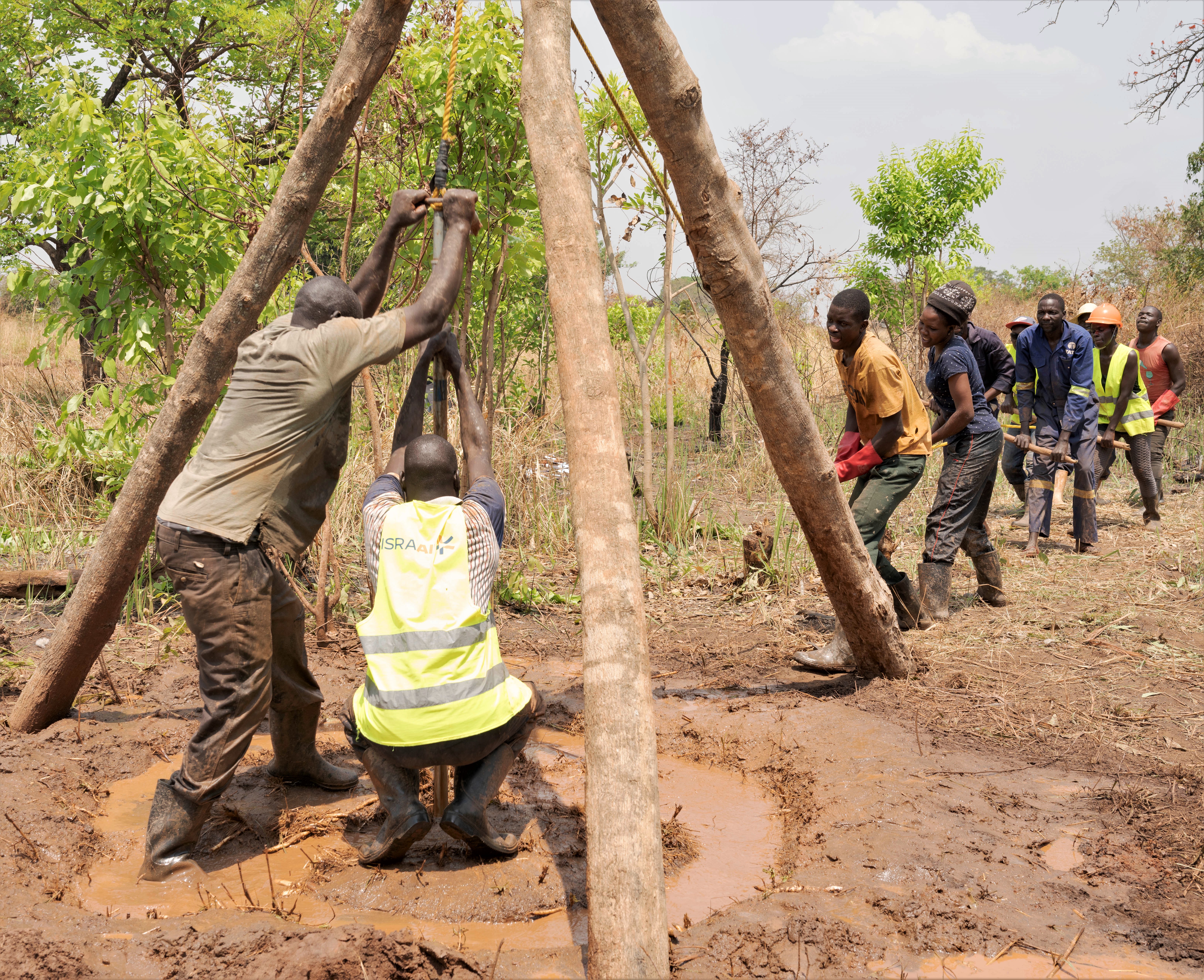 Image of hand drilling well in Teolam.